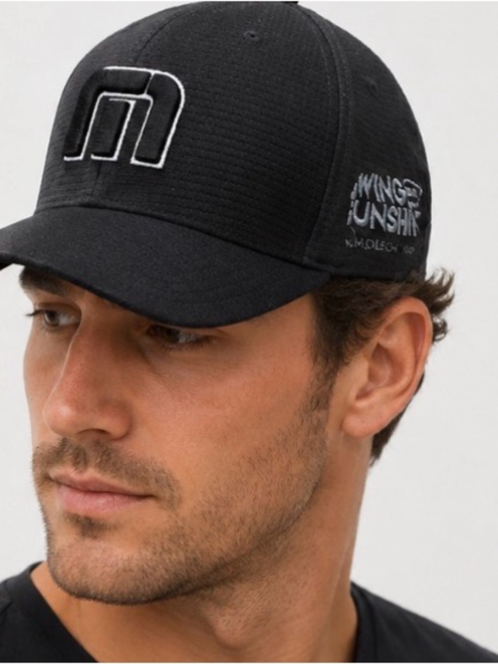 Travis Mathew Performance Snapback Hat Black embroidered side 110 flex fit NWOT